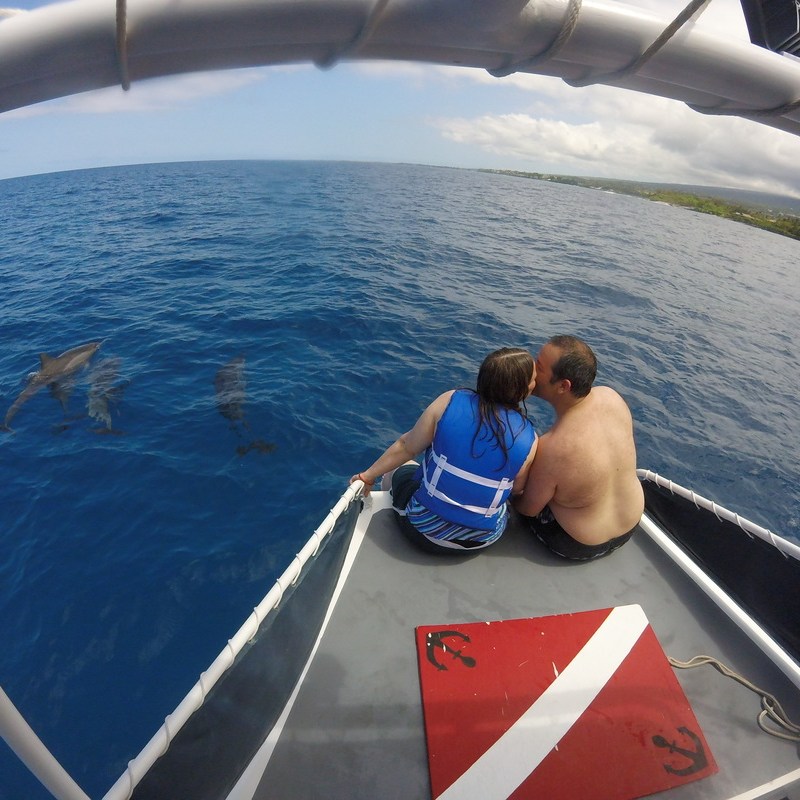 Couple on private charter in Kealakekua Bay with Spinner Dolphins