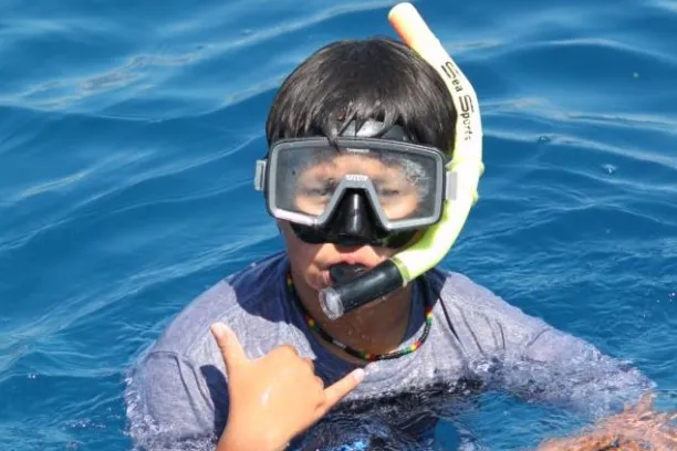 Boy Snorkeling in Captain Cook's Monument