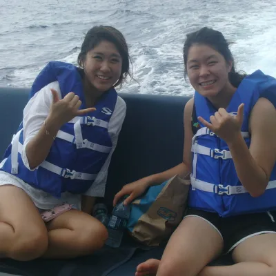 Two Girls on boat ride to Captain Cook's Monument