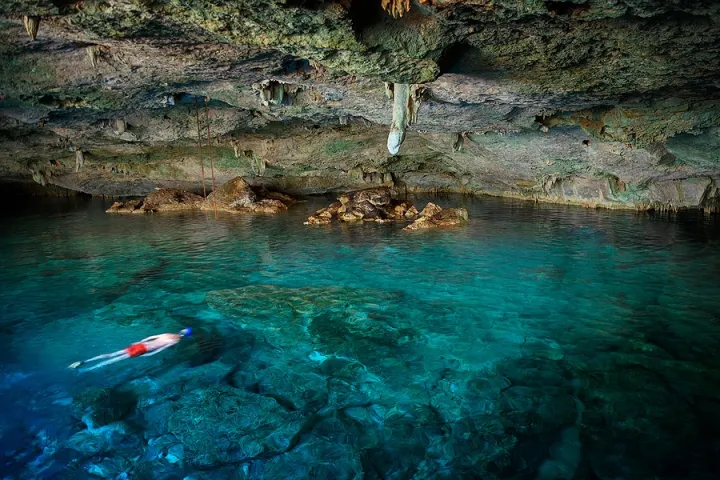 a small boat in a body of water
